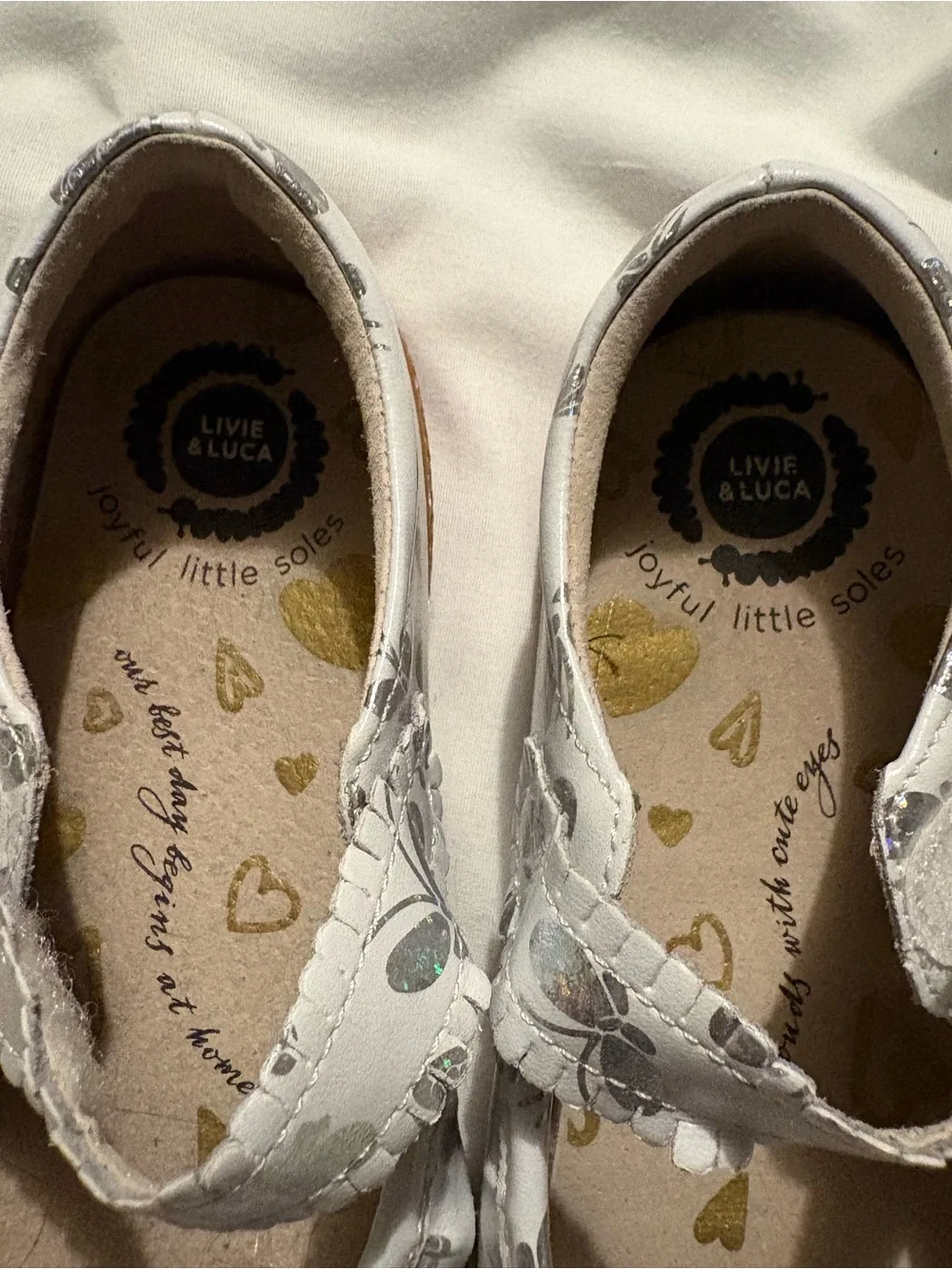 Livie & Luca White Mary Jane Shoes with Silver Holographic Butterflies